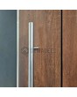 PIVOT V22 – Aluminium-Drehtür mit Holzdekor
